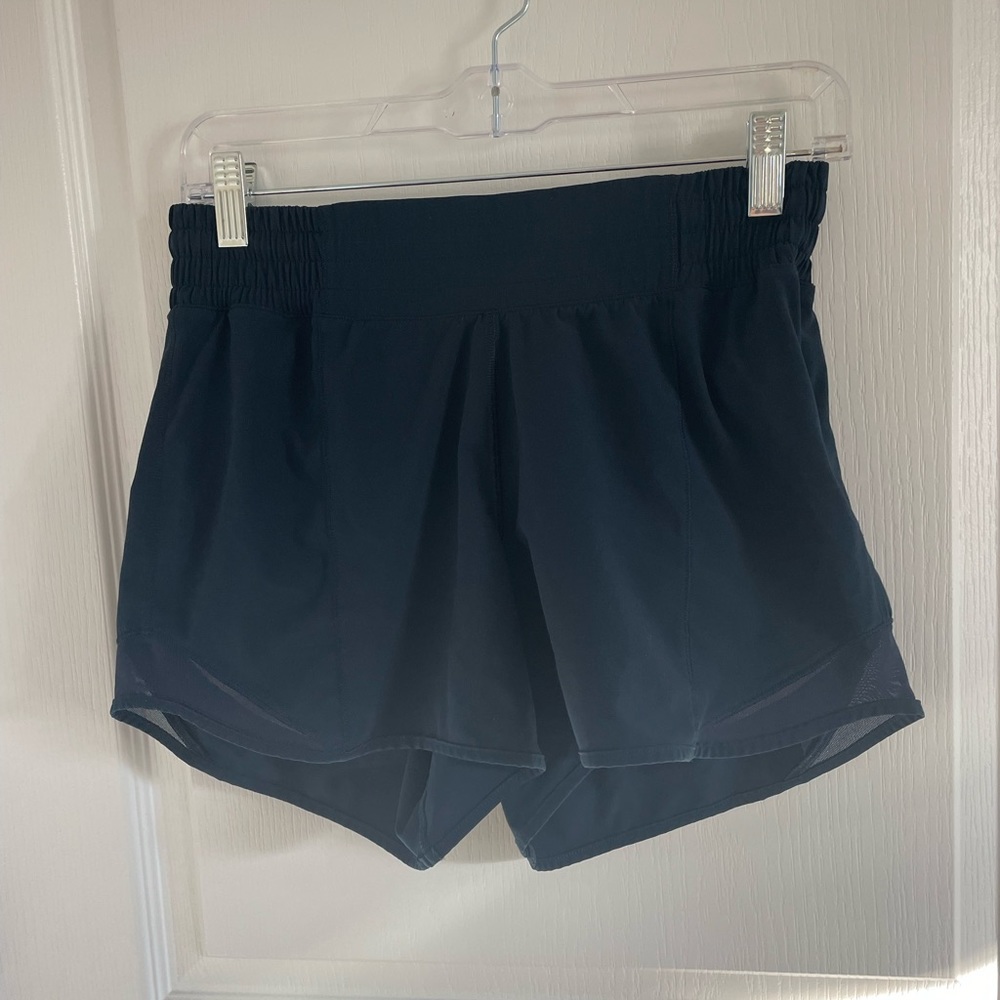 Lululemon navy 4 inch high rise Hotty hot shorts Sz 4